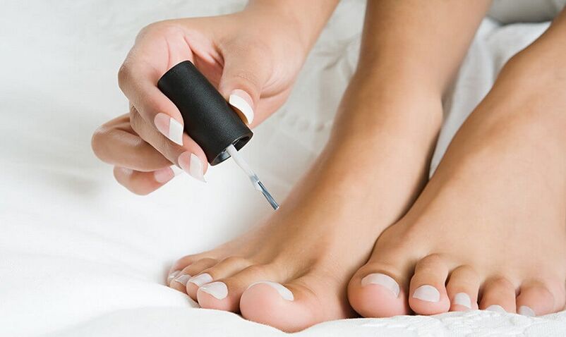 apply nail polish to treat toenail fungus